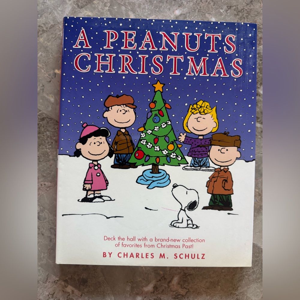 A Peanuts Christmas complete comic strip collection from 1950-1999 hard cover